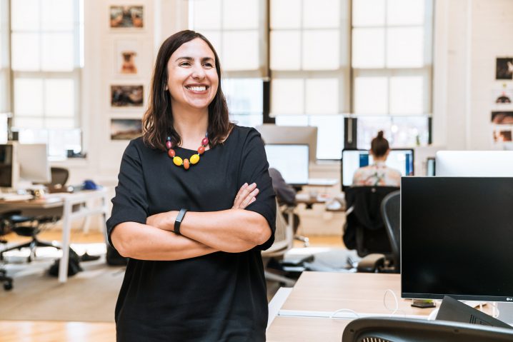 smiling-businesswoman-in-office_4460x4460